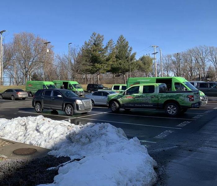 SERVPRO vehicles parked out front.