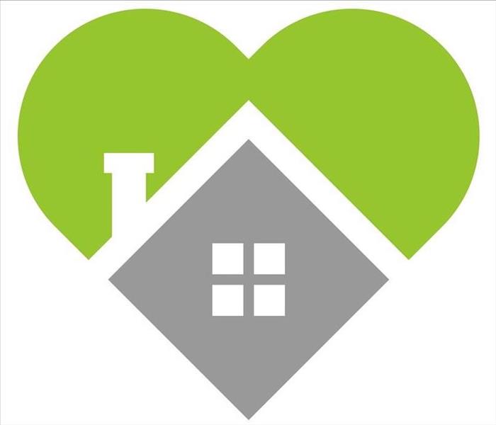 Green heart with grey house